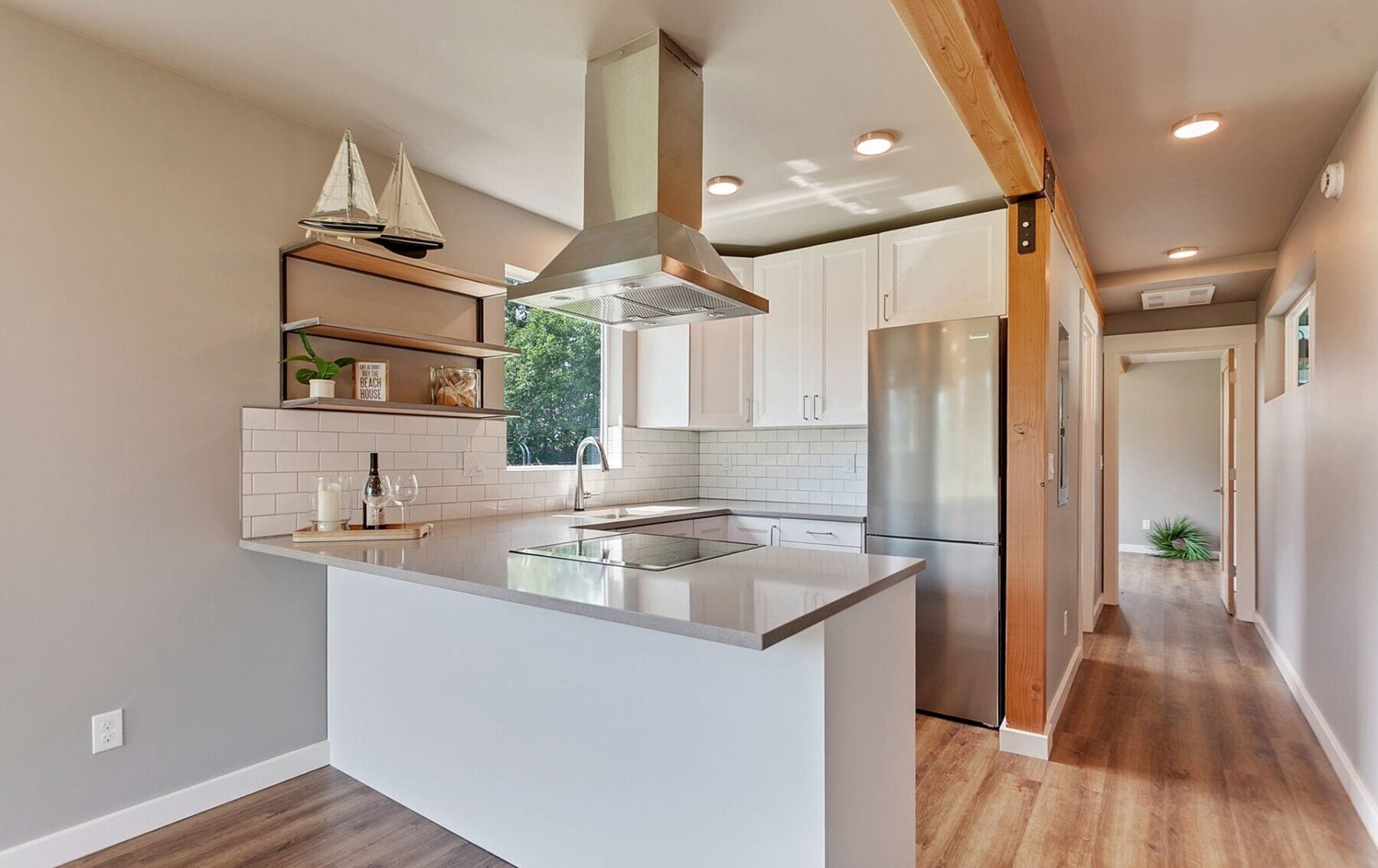 Modern kitchen in a shipping container home featuring eco-friendly materials, modular design, and open layout for sustainable living.